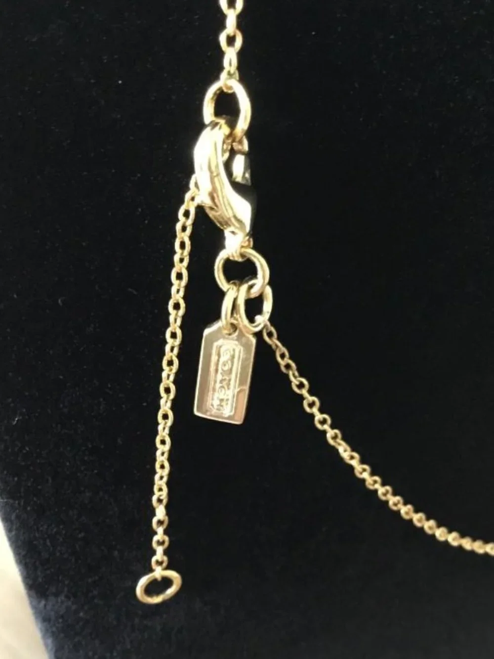 Coach Gold-tone Heart Pendant Necklace with Pink Crystals